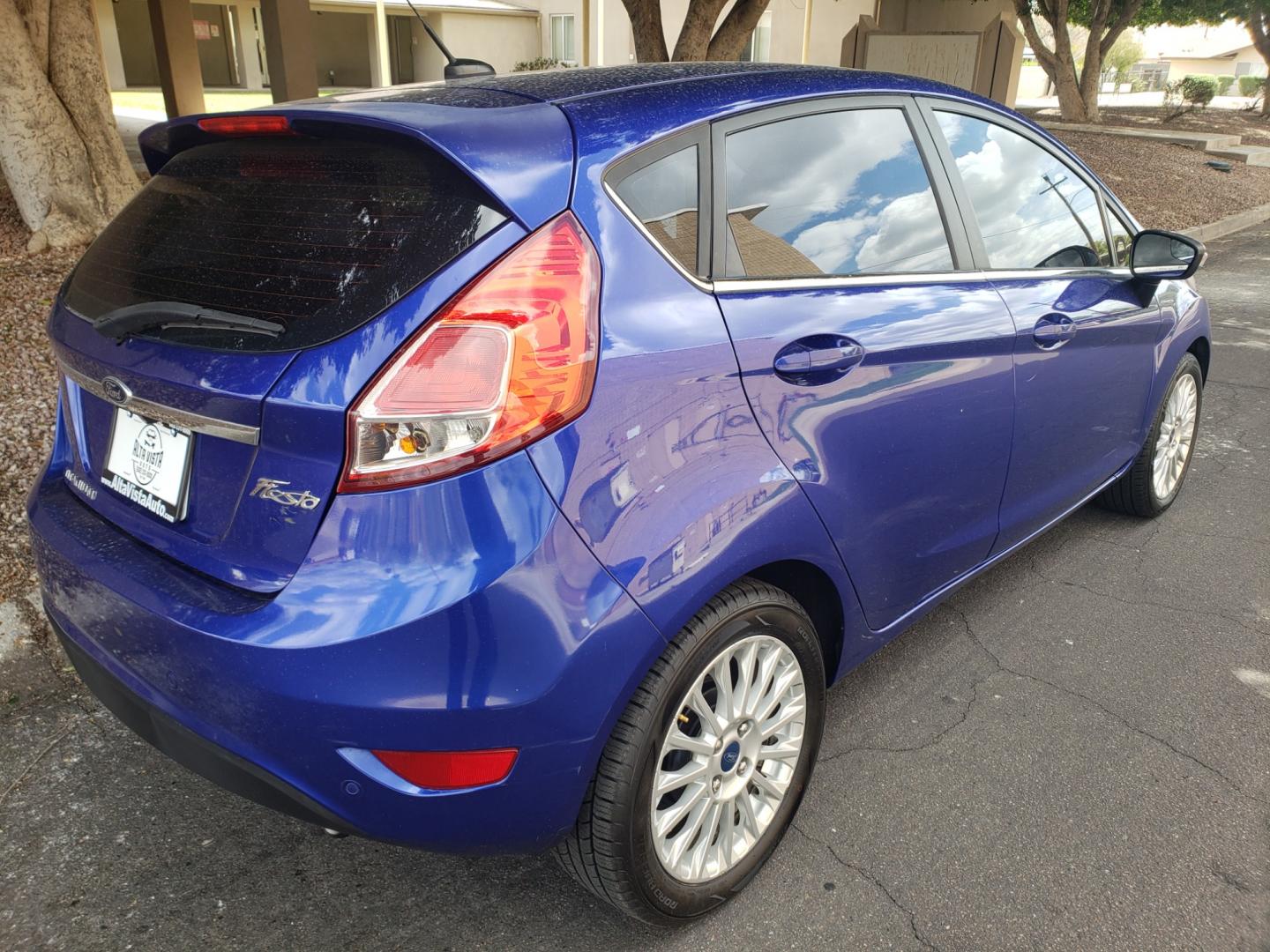 2014 /Tan and black Ford Fiesta Titanium (3FADP4FJ5EM) with an 1.6l i4 engine, 6-Speed Automatic transmission, located at 323 E Dunlap Ave., Phoenix, AZ, 85020, (602) 331-9000, 33.567677, -112.069000 - 2014 Ford Fiesta Titanium,.......A Must See!!... No accidents, Only 95K MILES.... Ice cold AC. The car is gorgeous inside and out. Power windows, Power door locks, Touch screen Stereo/ CD Player, Phone sync, Bluetooth, Satellite compatible, Backup camera, Beautiful tan and black interior with tan le - Photo#3